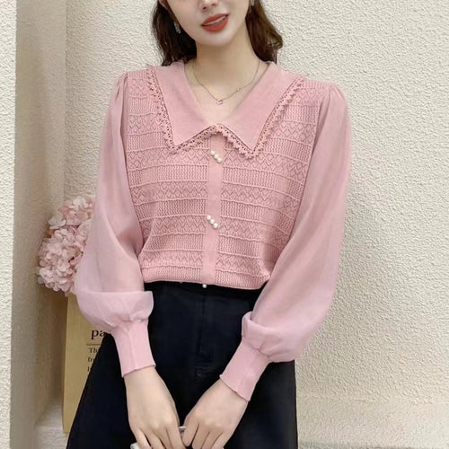 Women's blouse with lace collar and decorative buttons