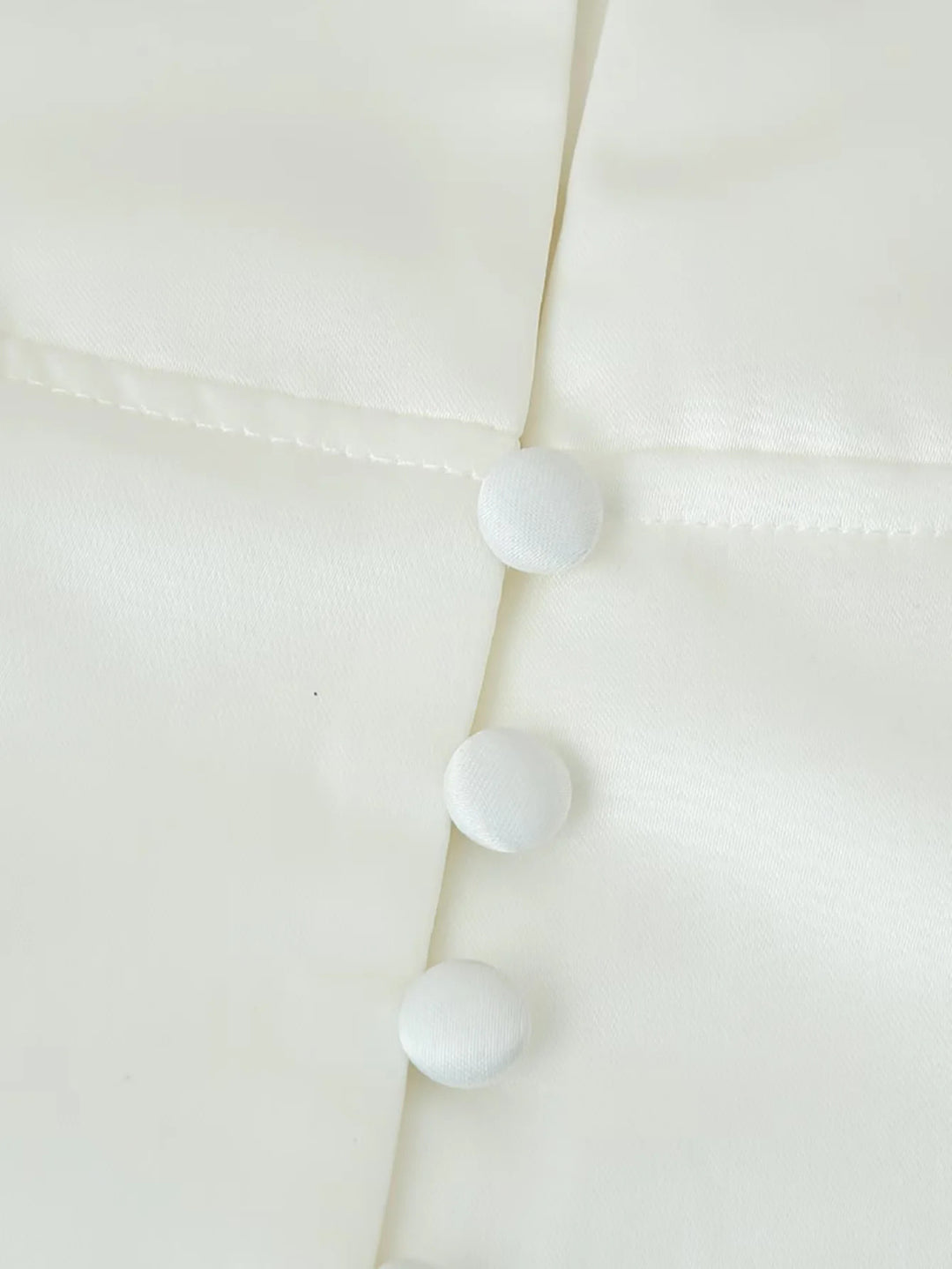 Fitted blouse for women with modern button details and a high collar Lune London