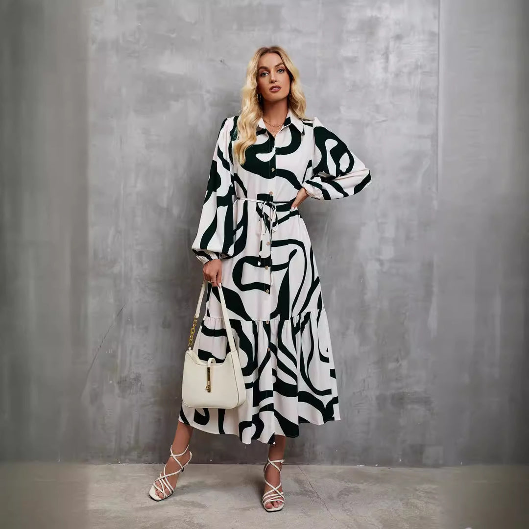 Long sleeve women's dress with trendy pattern and practical belt.