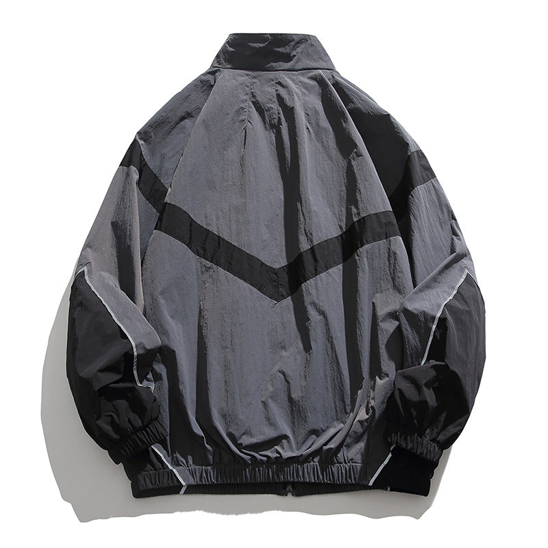 [Unisex] Oversize technical wind and rain jacket with stand-up collar, reflective piping, and elastic hem Amarae