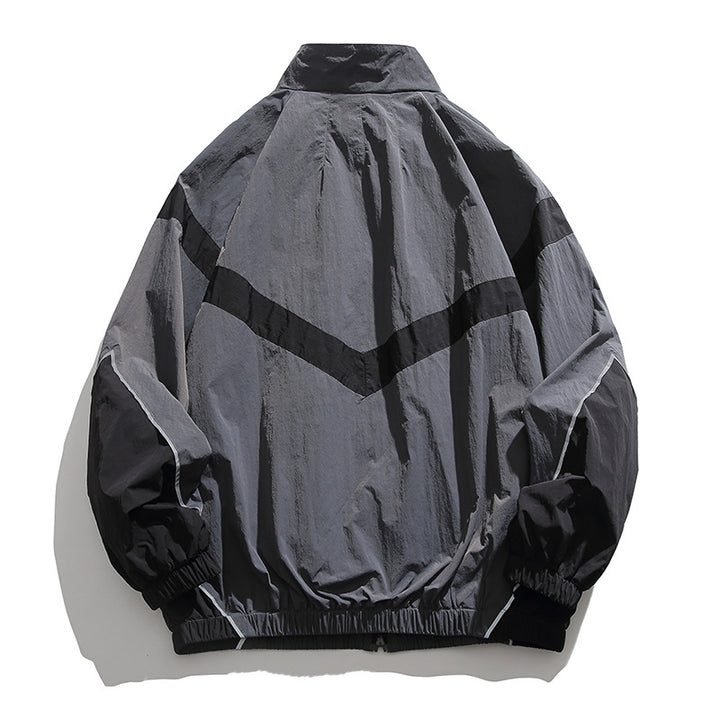 [Unisex] Oversize technical wind and rain jacket with stand-up collar, reflective piping, and elastic hem Amarae