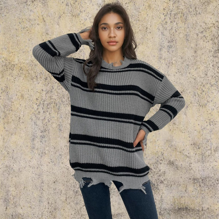 Oversized chunky knit sweater for women with fringes and cross stripes Lune London