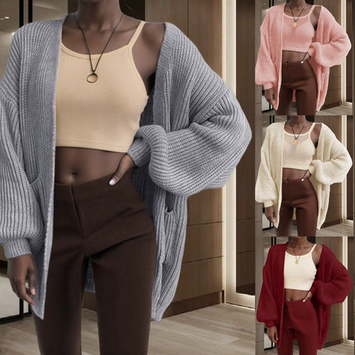 Cardigan pour femmes en tricot épais avec des manches volumineuses et des poches pratiques Chic & Stil