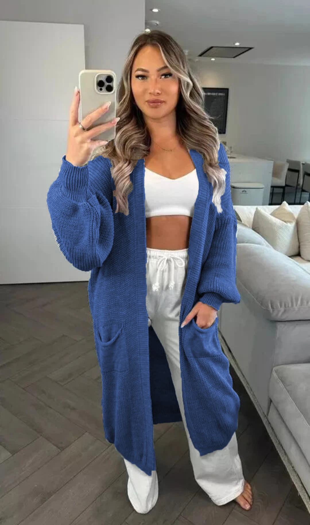Chunky knit cardigan for women with a relaxed oversized style with practical pockets Lune Londonl