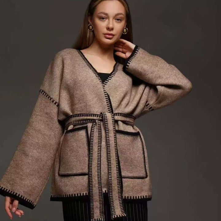 Loose fit knitted women's jacket with decorative belt Lune London