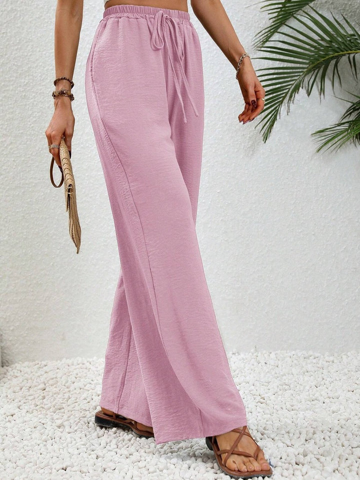 Loose-fit leisure pants for women with an elastic waistband and practical side pockets Lune London