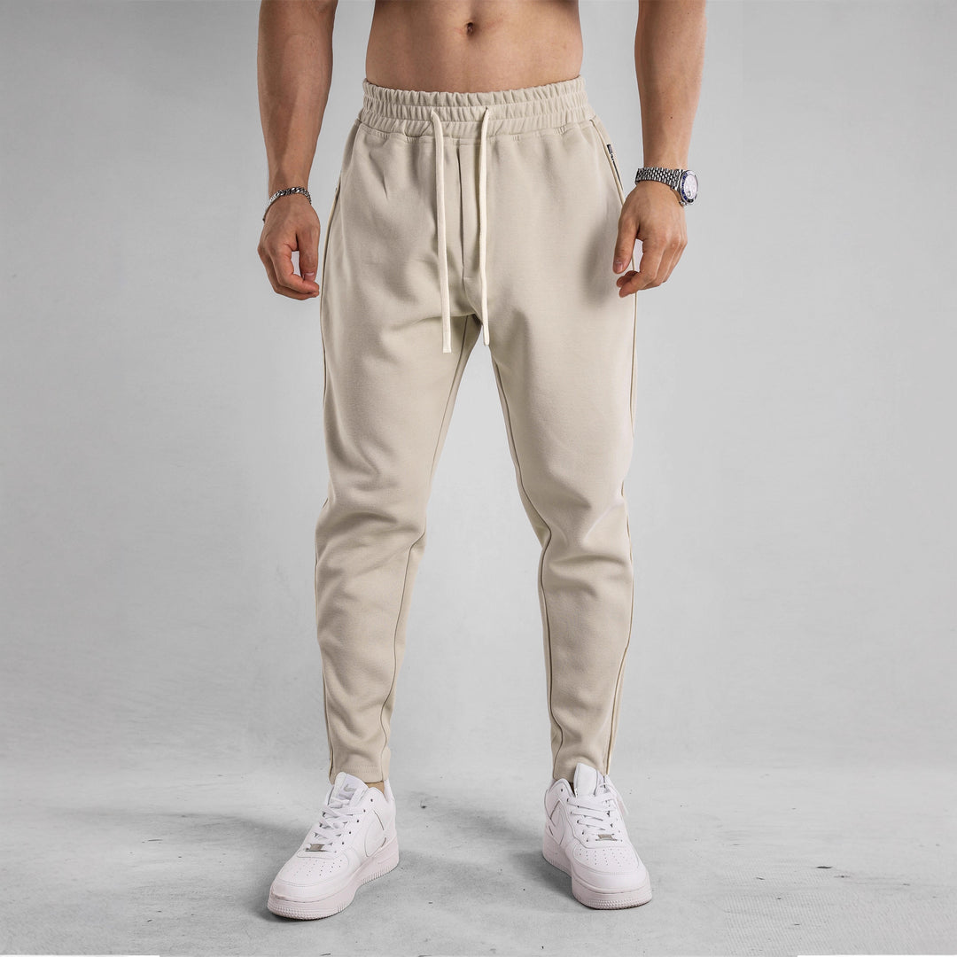 Sporty jogging pants for men with elastic waistband and side zip pockets Lune London