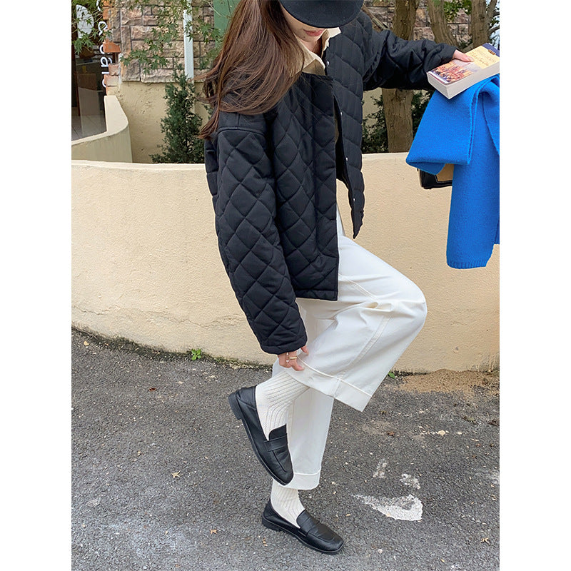Women's quilted transition jacket with classic collar and practical snaps Chic & Stil