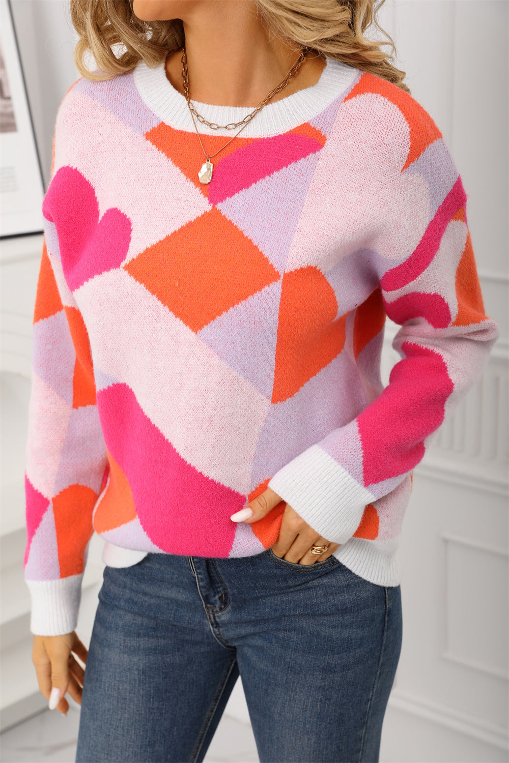 Pull féminin tendance avec motif géométrique créatif Chic & Stil