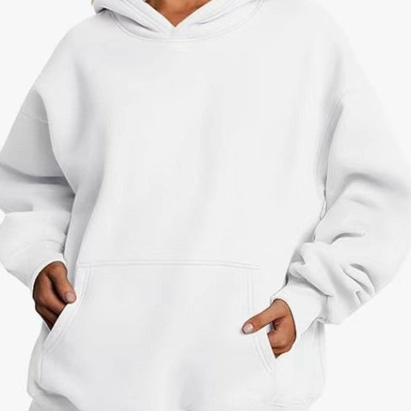 Women's oversized hoodie with practical kangaroo pockets and soft inner lining Chic & Stil
