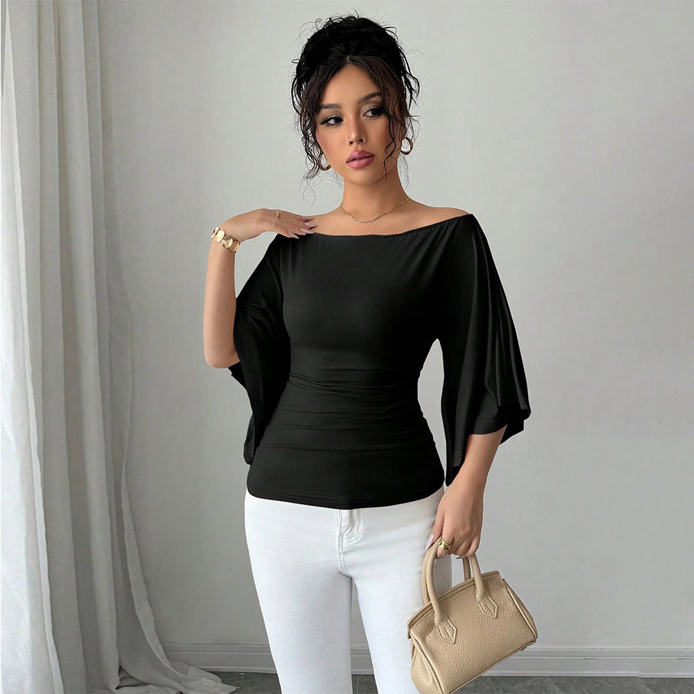 Haut élégant femme à épaules dénudées avec manches larges et coupe ajustée Chic & Stil