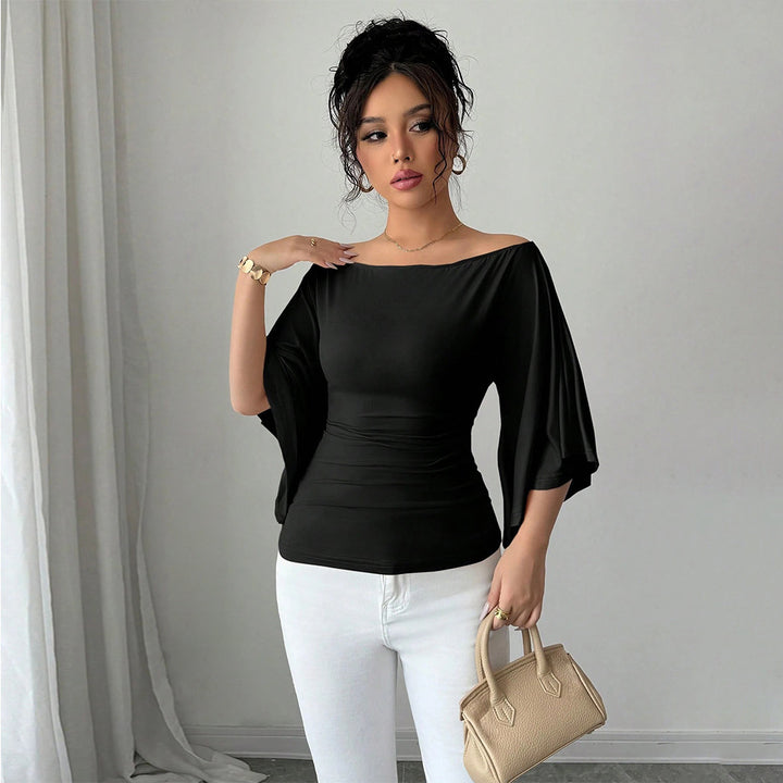 Haut élégant femme à épaules dénudées avec manches larges et coupe ajustée Chic & Stil