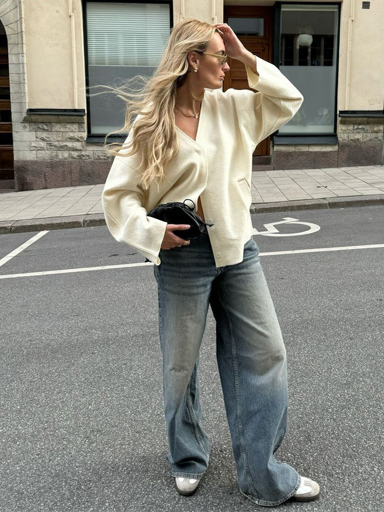 Women's chunky knit cardigan with deep V-neckline, boxy oversized silhouette and patch pockets Amarae