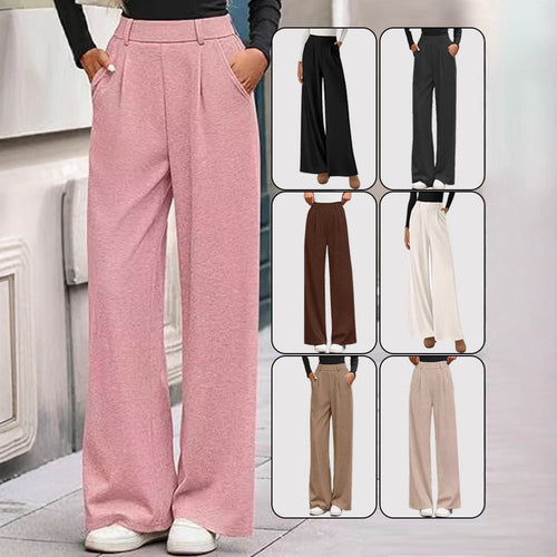 Loose fabric trousers for women with high waist and practical pockets. Chic and style