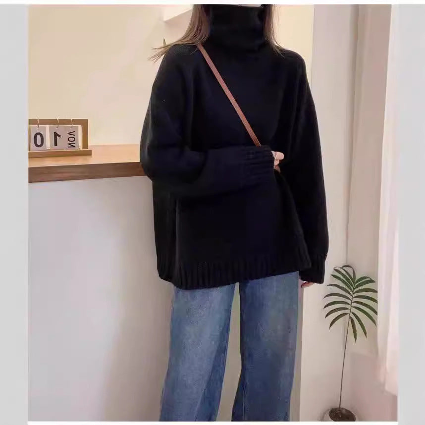 Pull en tricot épais pour femmes avec col montant et fentes sur les côtés Chic & Stil
