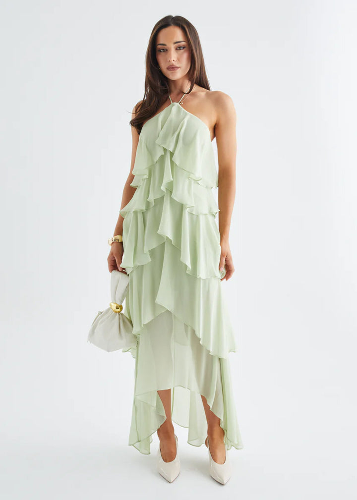 Chic & Stil Women's maxi dress with elegant overlay and floral ruffles