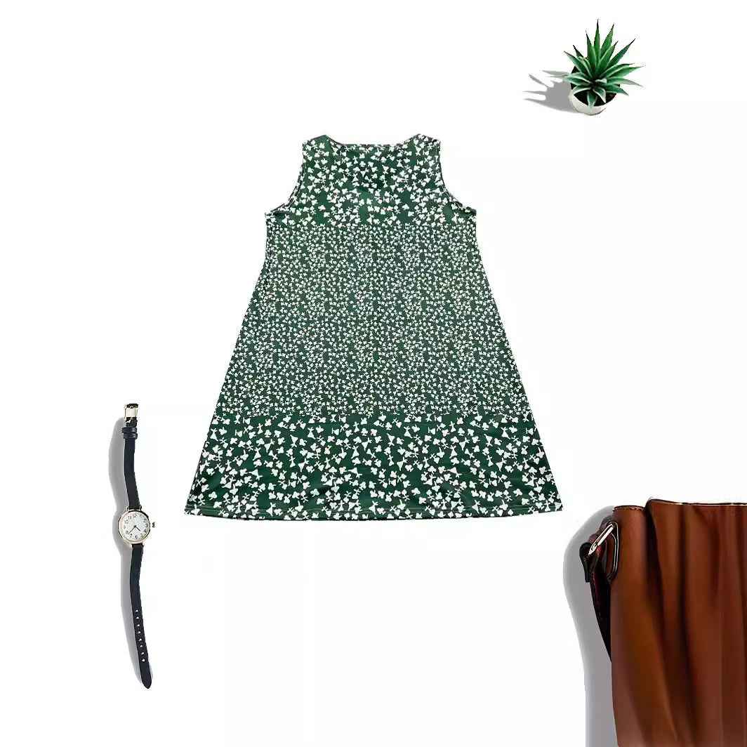 Airy summer dress for women with a playful floral pattern and a fluid silhouette Lune London
