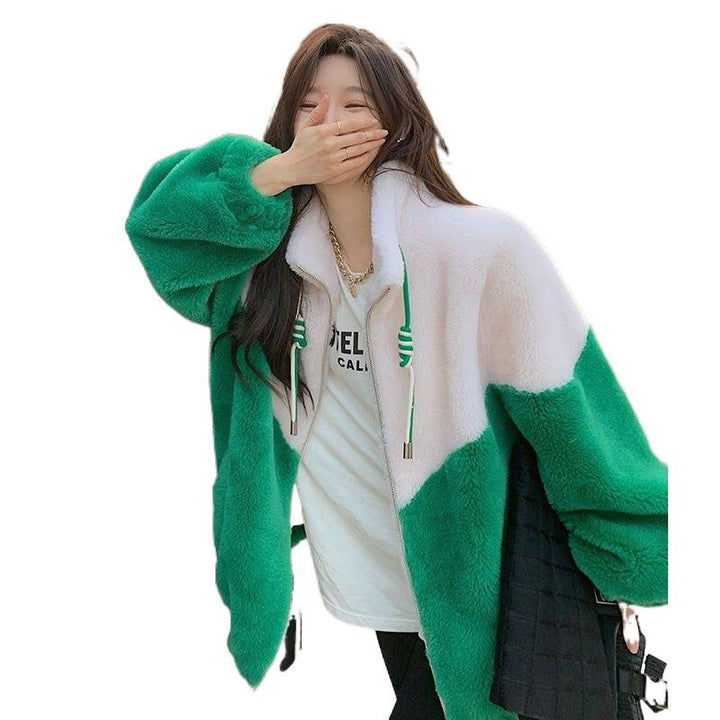 Women’s plush jacket with high closing collar and practical zippered pockets Chic & Stil