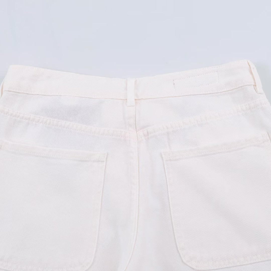 Ladies' wide jeans with a high waist, pressed crease, and patch pockets.