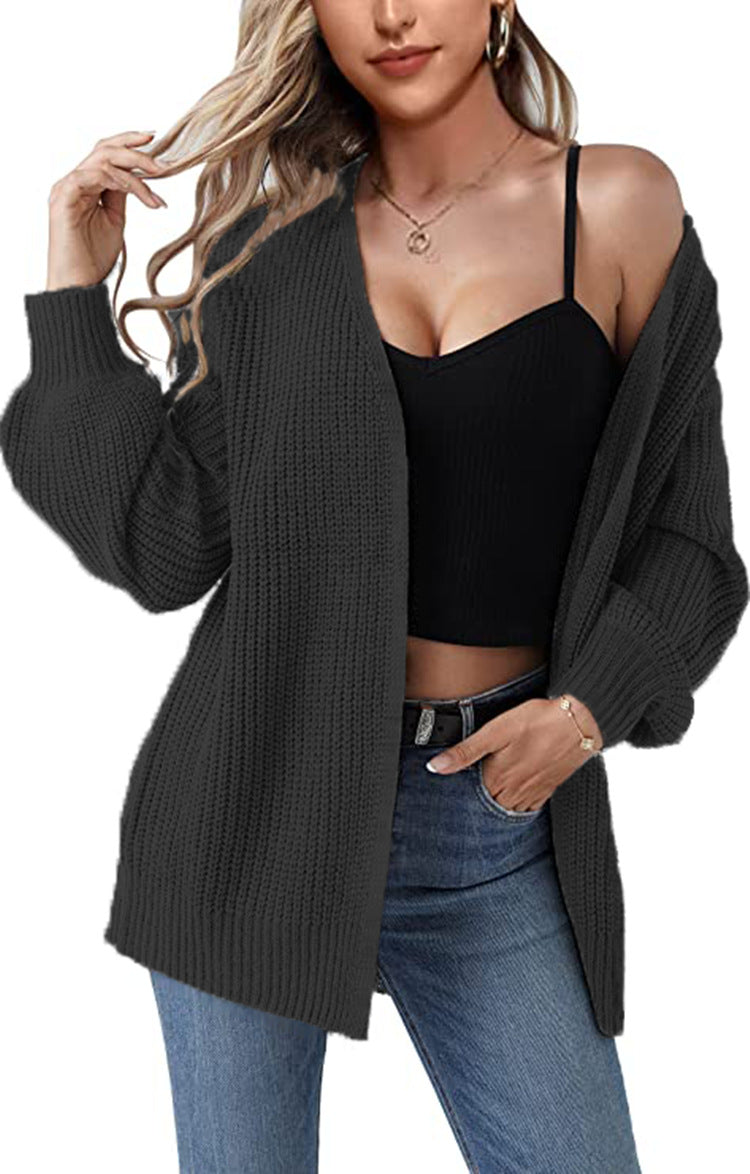 Ladies chunky knit cardigan with relaxed fit and open sleeves Lune London