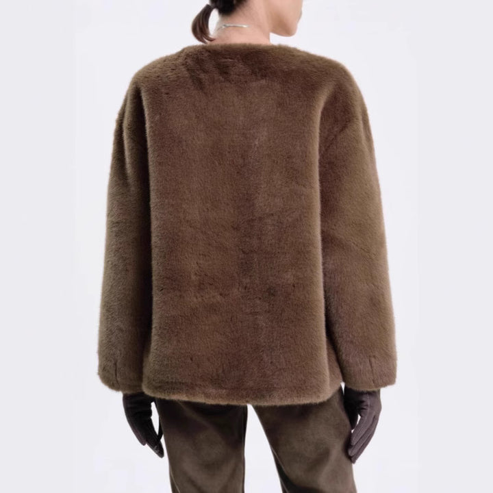 Ladies quilted cozy jacket with adjustable design at the waist and elegant belt Amarae