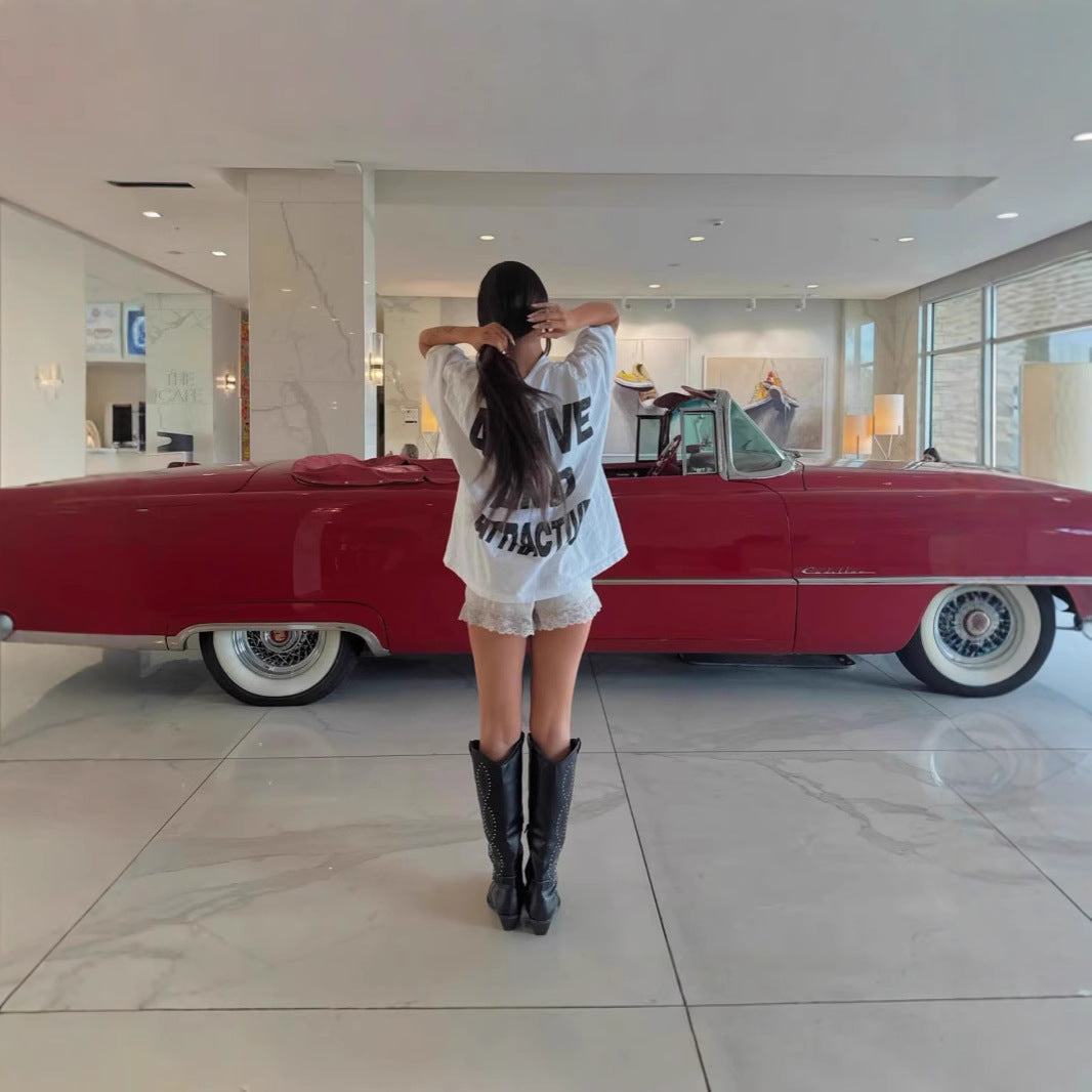 Women's Oversized T-Shirt with Dynamic Sports Design Chic & Stil