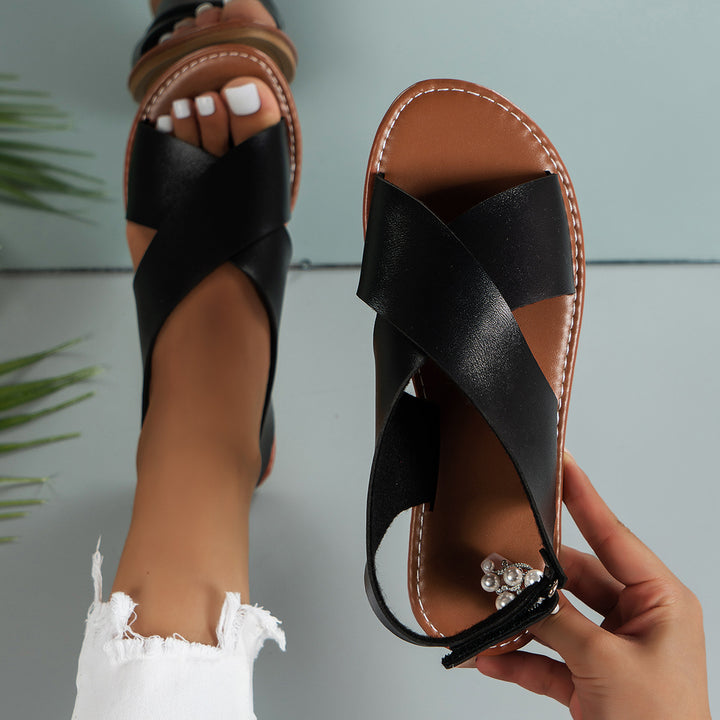 Women's strappy sandals with a modern cross design Lune London