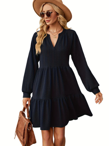Casual women's dress with V-neck, puff sleeves, and ruffled hem Amarae