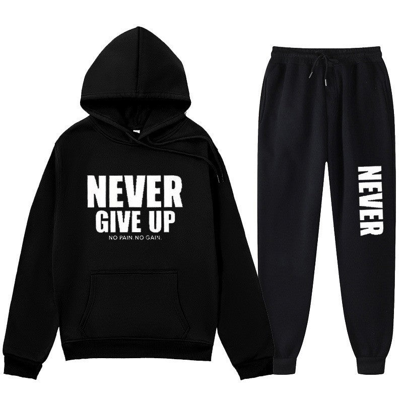 Women's training pullover and jogging pants in motif set with motivating print Chic & Stil