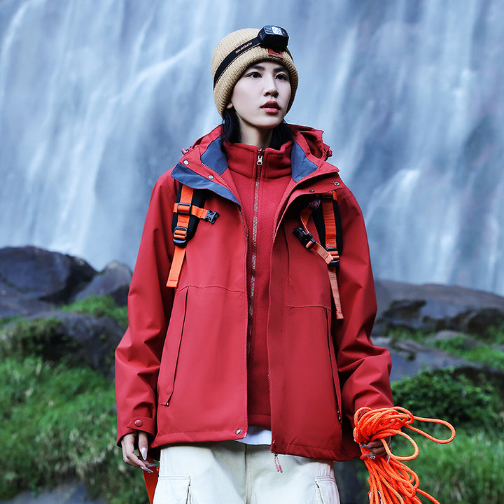 Women’s technical multi-layer hardshell rain jacket with adjustable hood, chest strap, and water-resistant zippers Amarae