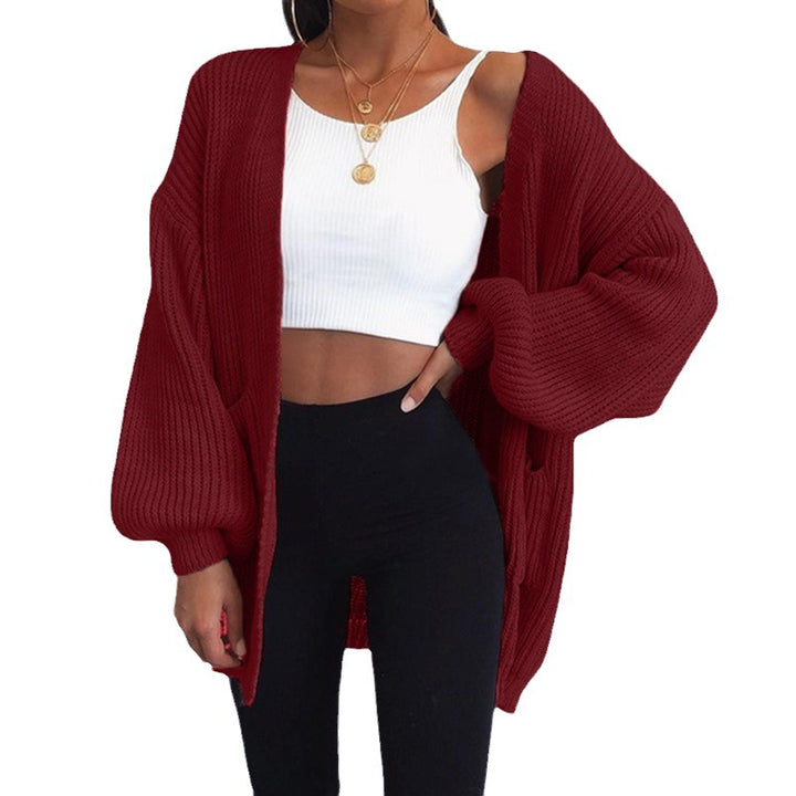 Thick knitted cardigan for women with relaxed oversized sleeves and large pockets Lune London
