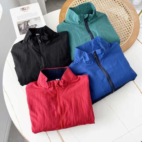 Veste féminine légère de transition avec col montant Chic & Stil
