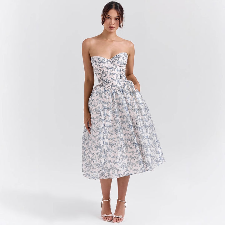 Ladies' couture dress in an off-the-shoulder strap design with a voluminous skirt Lune London