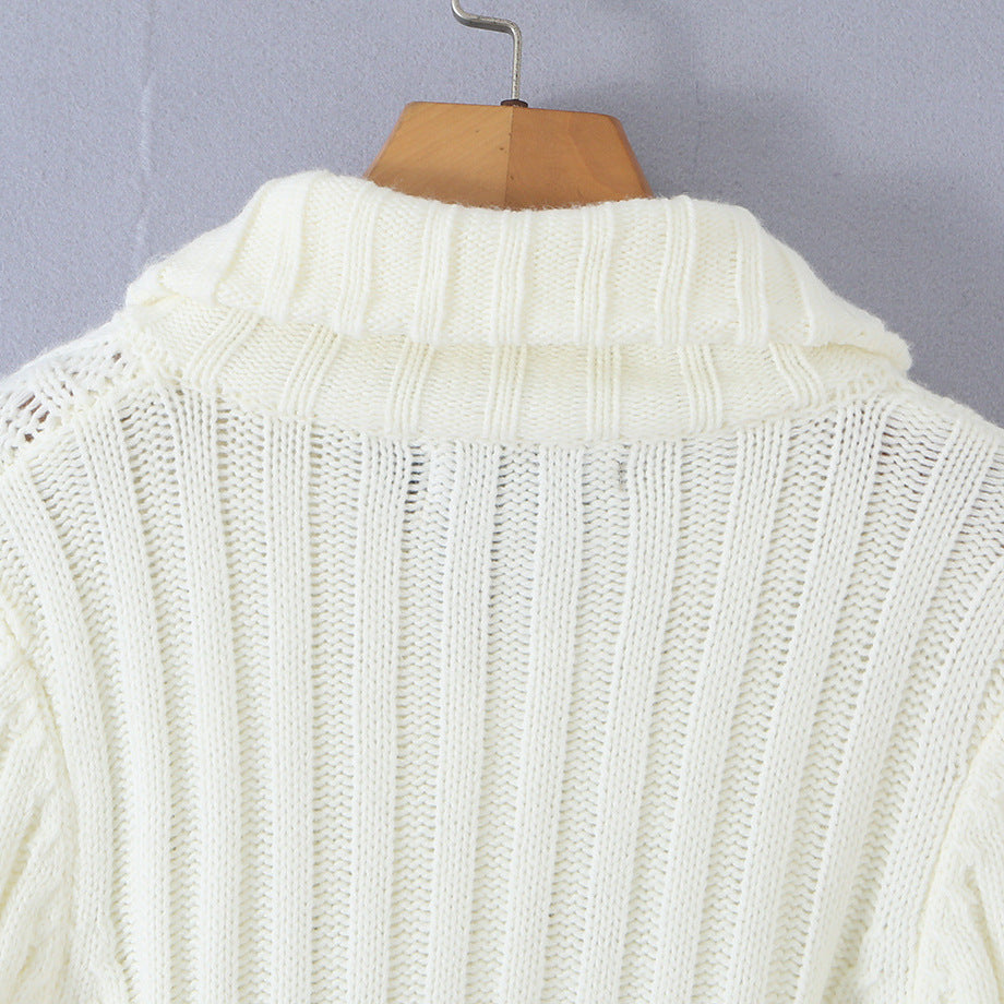 Ladies short knitted cardigan with stand-up collar, cable pattern, wooden button toggles and pockets Amarae