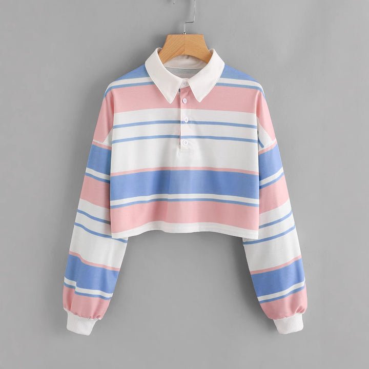 Women's polo shirt in a casual crop design with a stylish color block pattern Chic & Stil