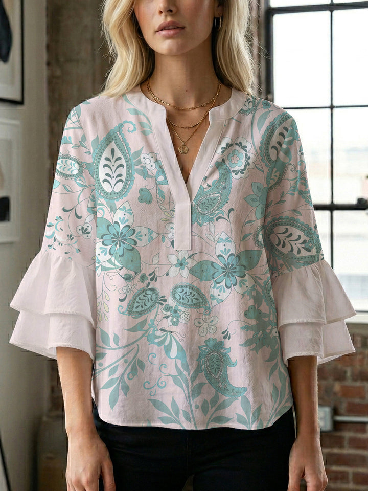 Ladies elegant blouse shirt with voluminous puff sleeves and graphic floral design Lune London