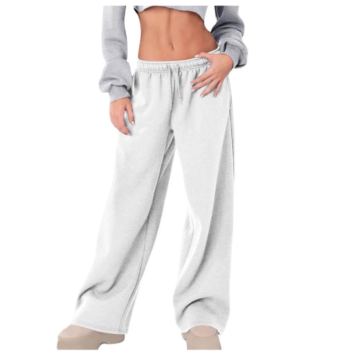 Women's loose casual pants with elastic waistband and side pockets Chic & Stil