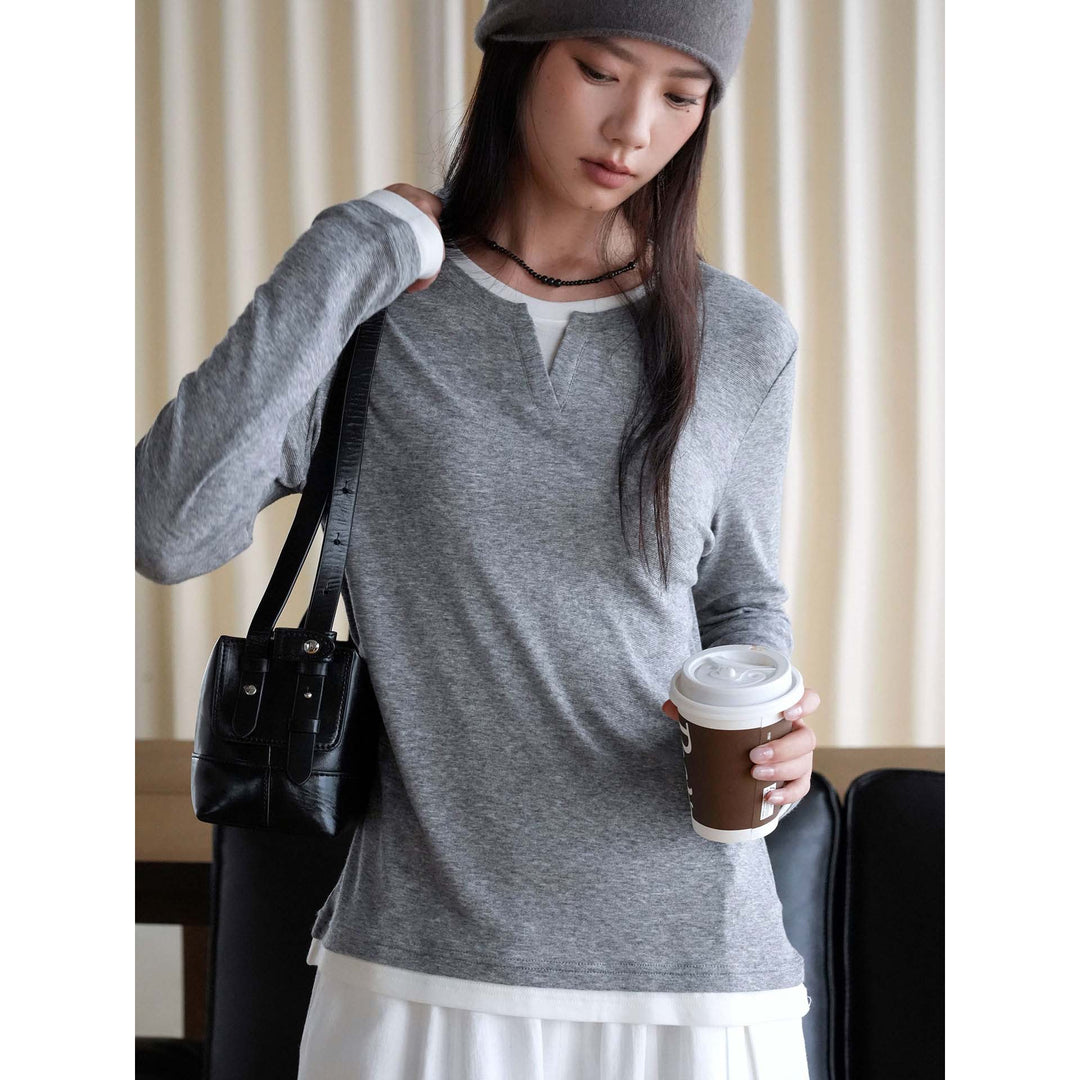 Women layered look long sleeve with notch at the neckline made of soft sweat fabric