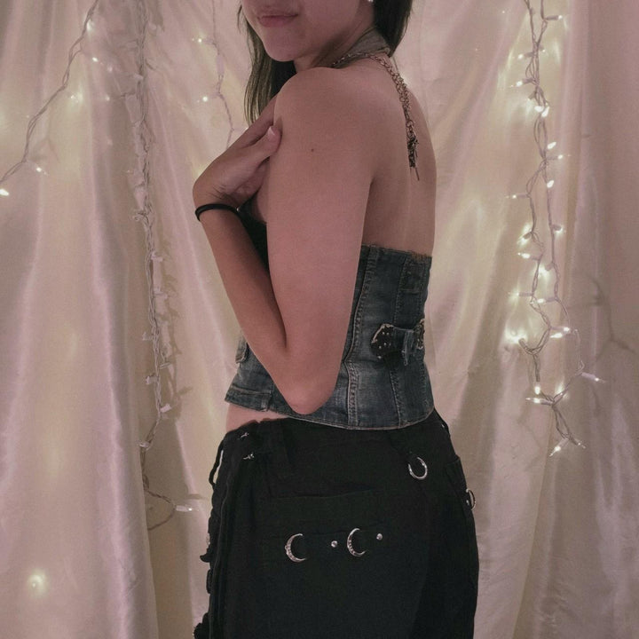 Women's denim crop top with decorative button details and deep V-neckline Lune London
