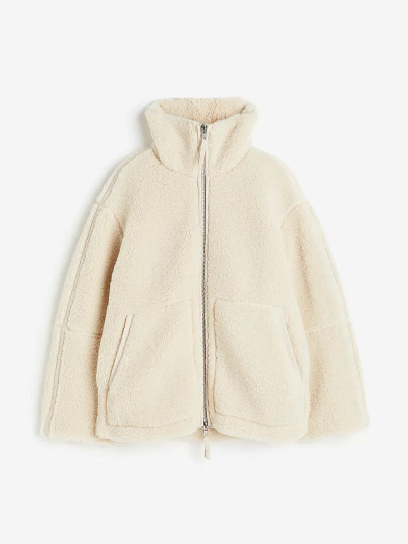 Ladies cozy fleece jacket with practical patch pockets and modern high collar Amarae