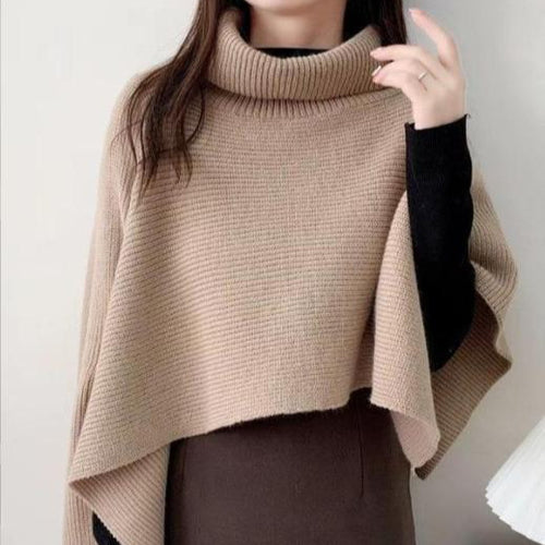 Ladies knitted poncho with high collar and asymmetrical cut Amarae