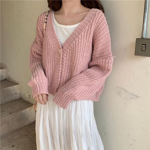Ladies short cardigan with deep V-neck and special button details Amarae