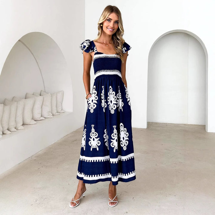 Women's maxi dress with floral embroidery and ruffle details Lune London