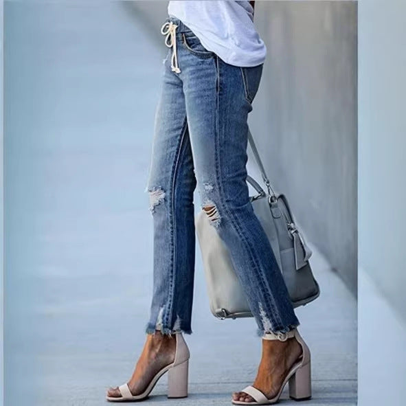 Women Cropped Denim Jeans with Drawstring Waistband, Destroyed Knee Areas and Raw Hem Amarae