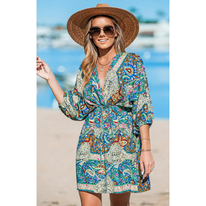 Women’s beach dress with a draped look and a trendy pattern Lune London