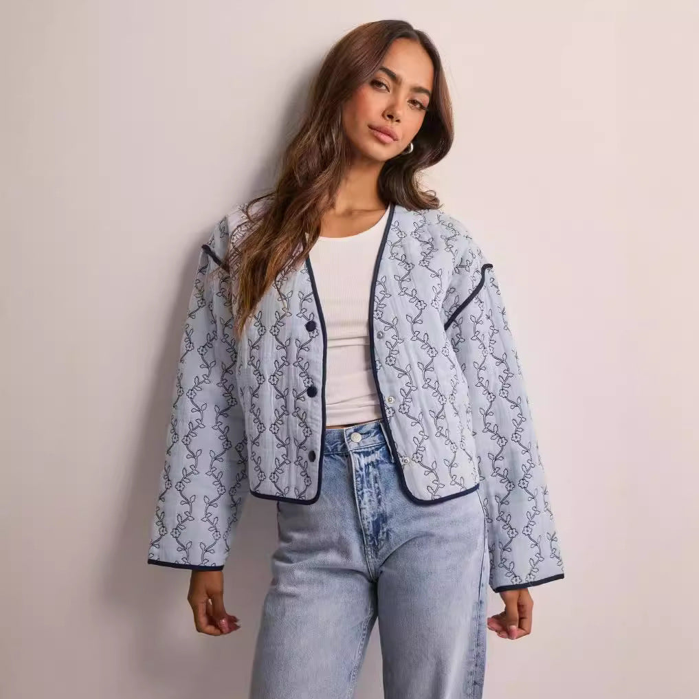 Women's lightweight quilted blouse jacket with V-neck, contrast piping and floral line print Amarae