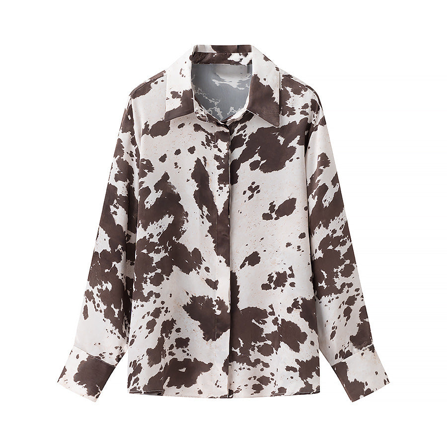 Women's loosely cut shirt blouse with cow spot print and concealed button placket Amarae