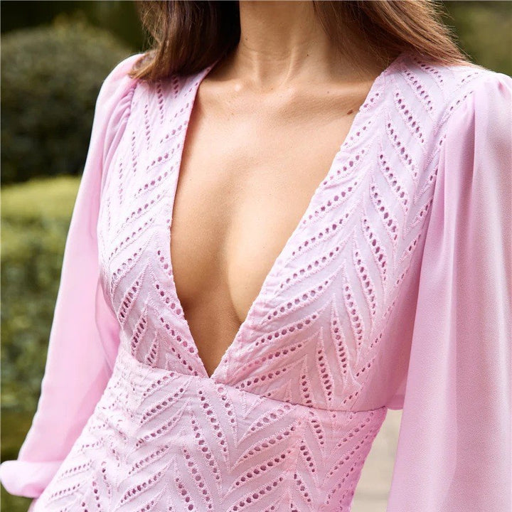 Mini dress for women with voluminous sleeves and a deep V neckline Lune London