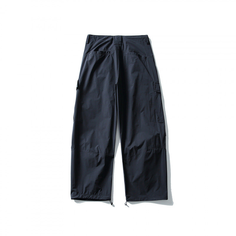 Men's loose technical cargo pants with drawstring waistband and adjustable leg closures Amarae