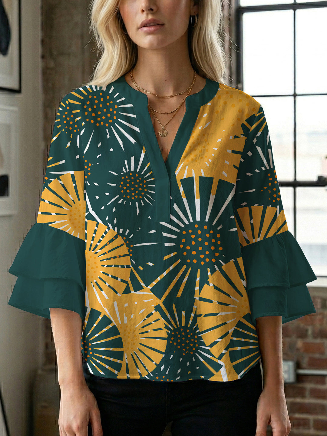 Ladies elegant top with voluminous ruffle hems and floral design Lune London
